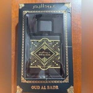 Oud Al Badr Perfume with Gold Accents